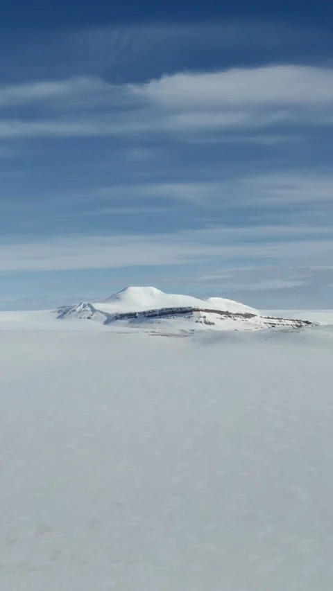 Vertical Drone Flight Over Snowy Inland Spitsbergen and Arctic Mountain Stock Footage 340035874