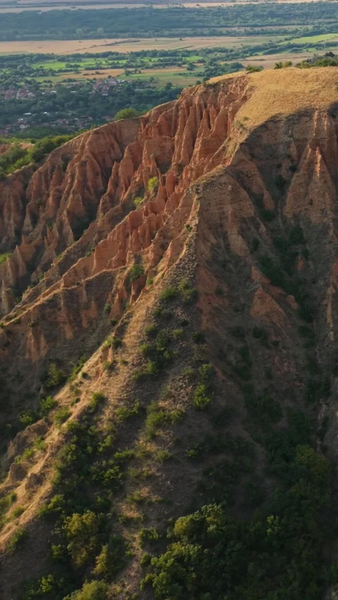 Vertical Drone Flight Over the Stob Pyramids Eroded Sandstone Formations in Stock Footage 317678138