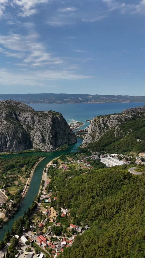Vertical drone flight over Ustina River canyon and mountains in Croatia Stock-Footage 345118796