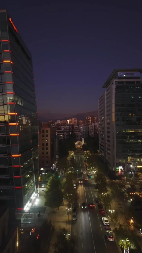 Vertical Drone Flight Past Mapfre Building to Sanhattan Skyline - 4K Stock Footage 333603307