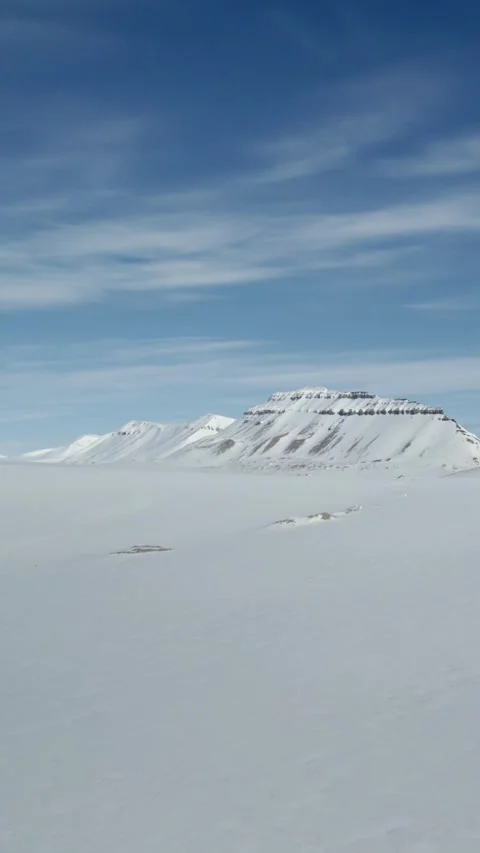Vertical Drone Flight Sliding Past Mountain in Inland Spitsbergen Stock Footage 340035816