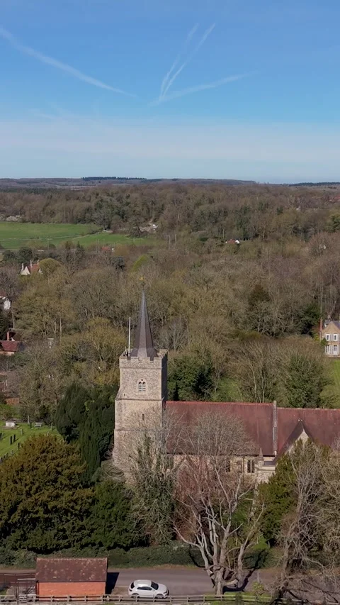 Vertical drone flight to St Mary's Church, Hertingfordbury, medieval stone 스톡 동영상 332824501