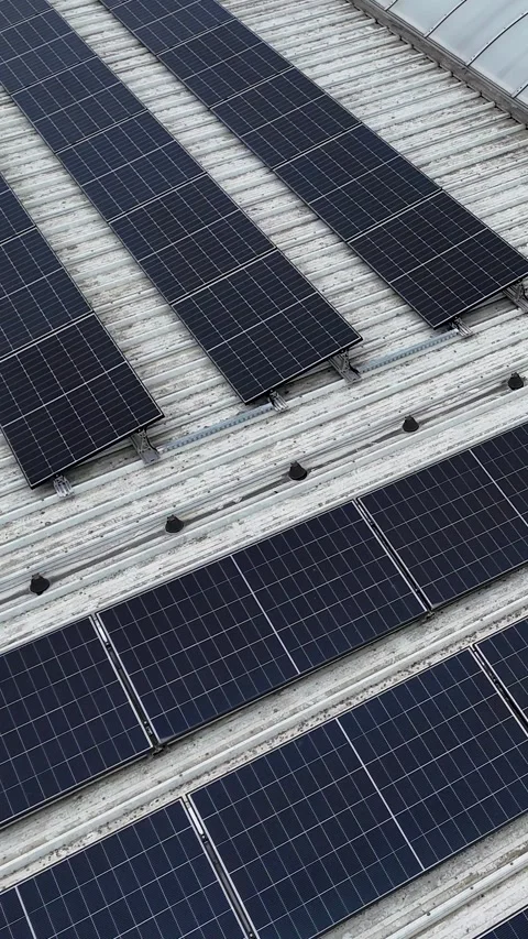 Vertical Drone Flying Forward Over Solar Panels On Industrial Roof Stock Footage 330750804