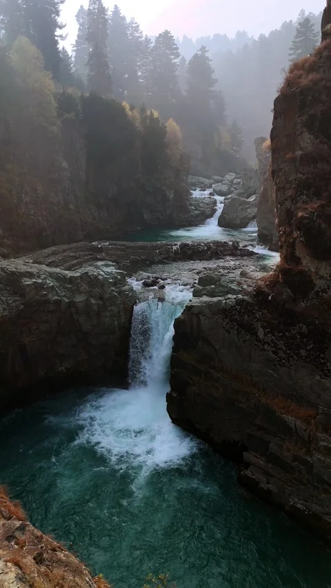 Vertical drone footage Aharbal’s roar is loud, but its beauty whispers forever. Stock Footage 311151737