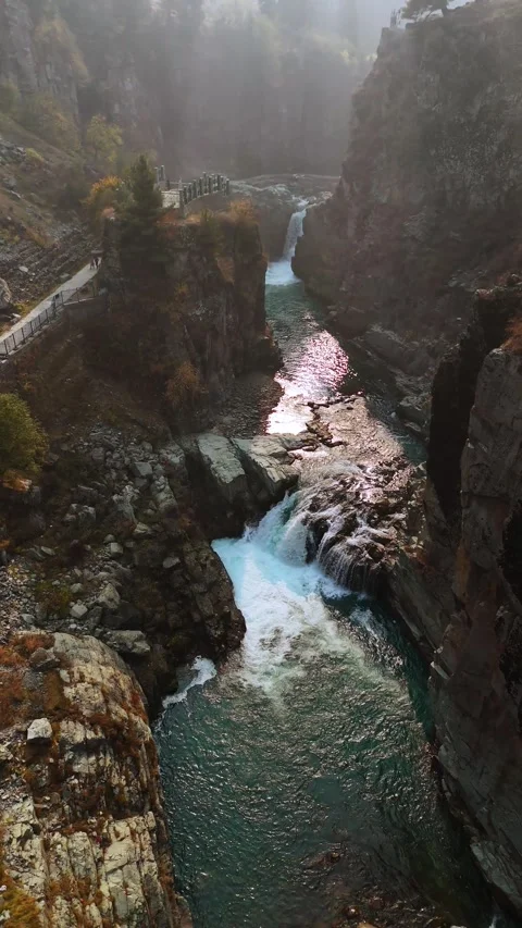 Vertical drone footage as I arc around Aharbal, every frame feels like a living Stock Footage 311151853