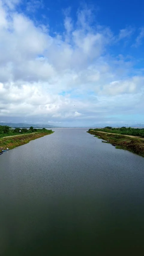 Vertical drone footage of Limboto Lake in the morning Stock Footage 275873553