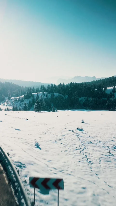 Vertical drone footage with a road in Bucegi Mountains, Romania Stock Footage 304670374