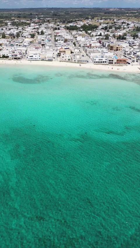 Vertical drone footage of Torre Lapillo beach, Italy. Stock Footage 317905057