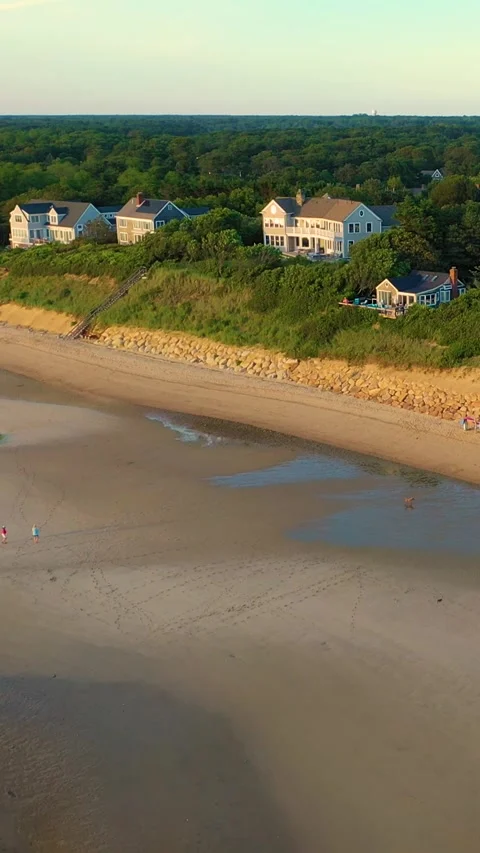 Vertical Drone Golden Hour Over Cape Cod Beach Dunes and Coastal Homes Stock Footage 328068887