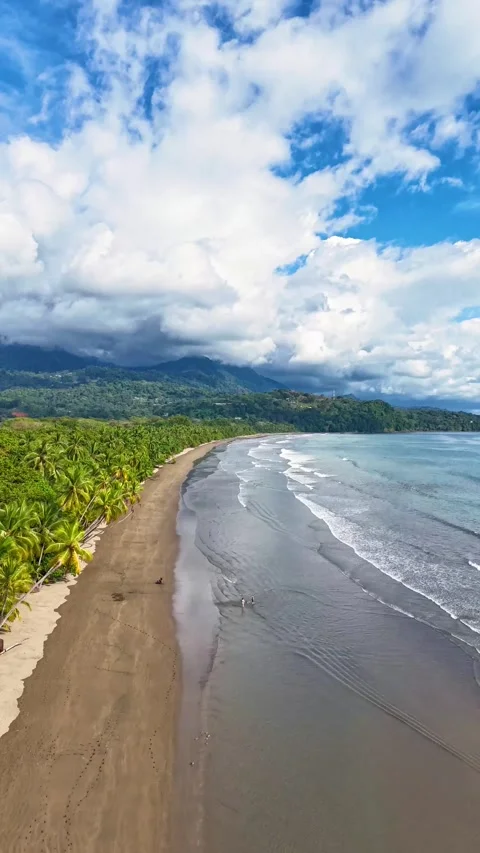 Vertical Drone Hyperlapse of Waves and Clouds at Playa Uvita Stock Footage 328598225