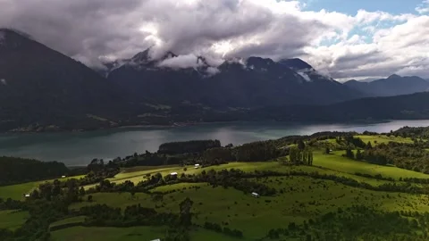Vertical Drone Hyperlapse: Weather Change Over Mountain Valley and Fjord Video stock 332816635