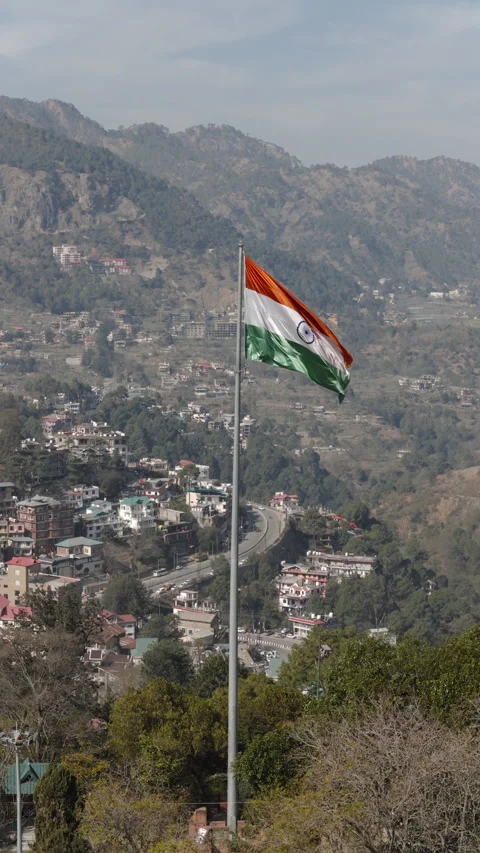Vertical Drone Orbit Around Indian Flag Above Solan Himachal Pradesh Stock Footage 329937660