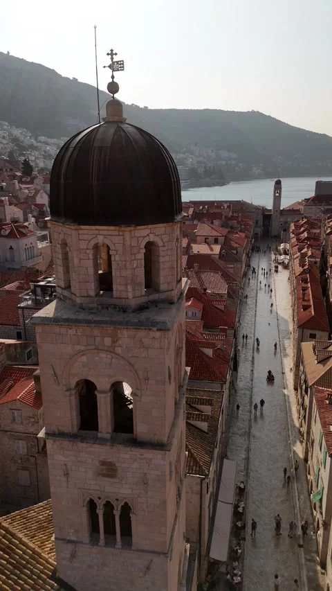 Vertical Drone Orbit Left Franciscan Church Bell Tower Dubrovnik Stradun Day 4K Stock Footage 337849338