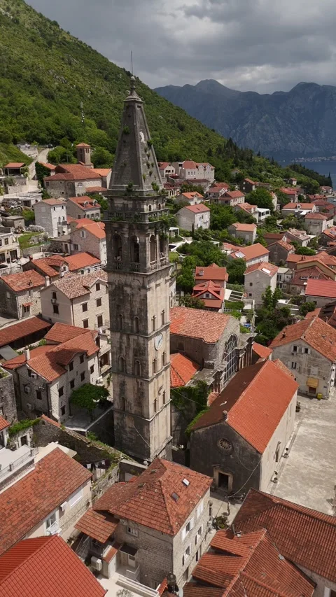 Vertical Drone Orbit of St Nicholas Church Bell Tower in Perast, 4K Stock-Footage 337180027