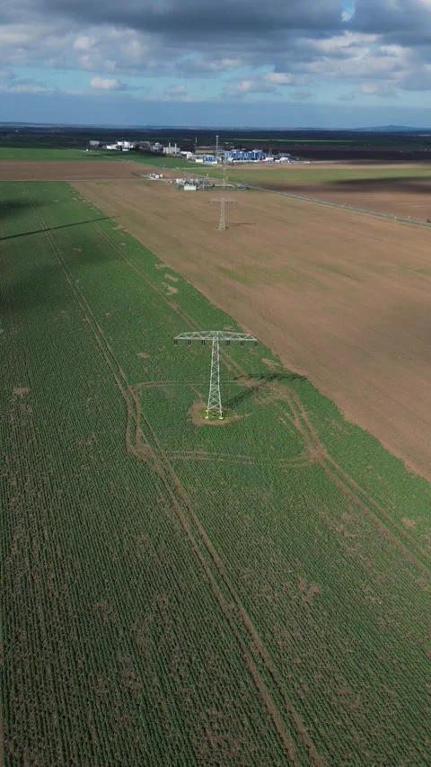 Vertical Drone Pullback from High-Voltage Power Lines – Germany 4K Stock Footage 341850684