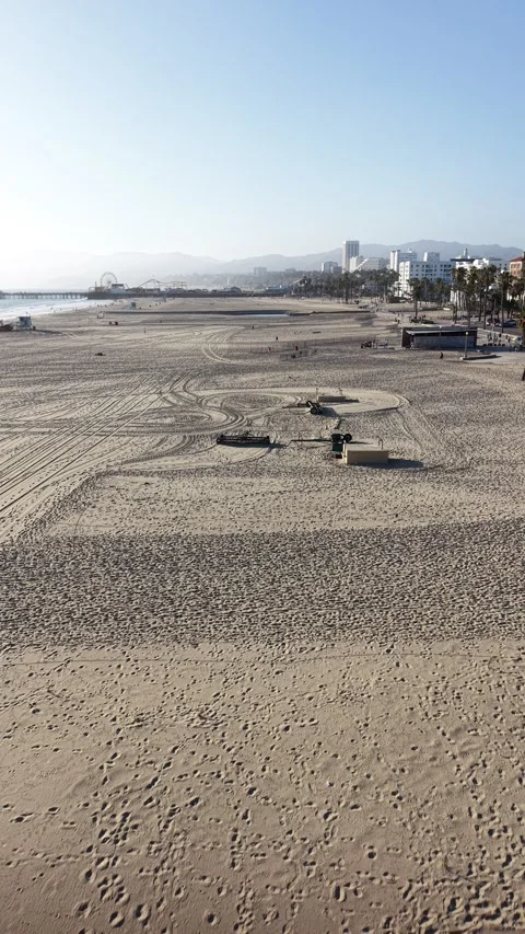 Vertical Drone Pullback Over Santa Monica Pier in Los Angeles 4K Stock Footage 332325221