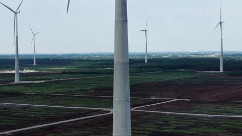 Vertical Drone Rise Along Wind Turbine Tower in Kaigu Bog, Latvia Stock Footage 341522036