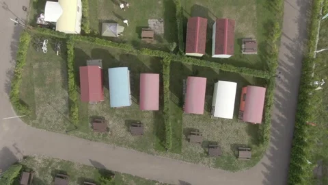 Vertical drone rise showing campground layout from above 库存影片 333954491