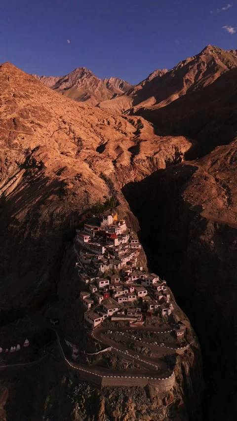 Vertical drone rising slowly above the sacred steps of Diskit Monastery. Stock Footage 310900914