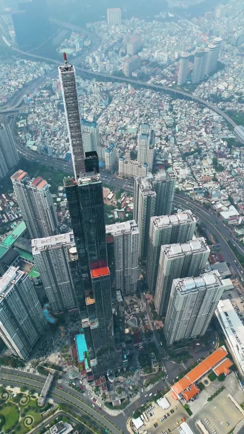 Vertical drone shot above the Landmark 81 supertall skyscraper in Ho Chi Minh Stock Footage 307158711