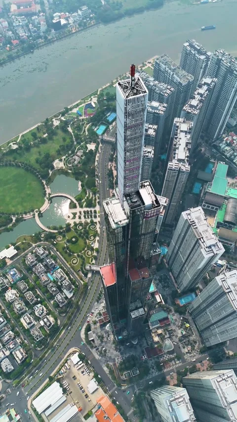 Vertical drone shot above the Landmark 81 supertall skyscraper in Ho Chi Minh Stock Footage 307300852