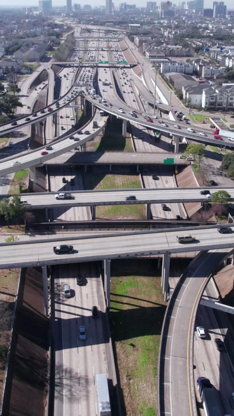 Vertical Drone Shot, Buzzing Traffic on Highway Interchange and Junction Stock Footage 283366687