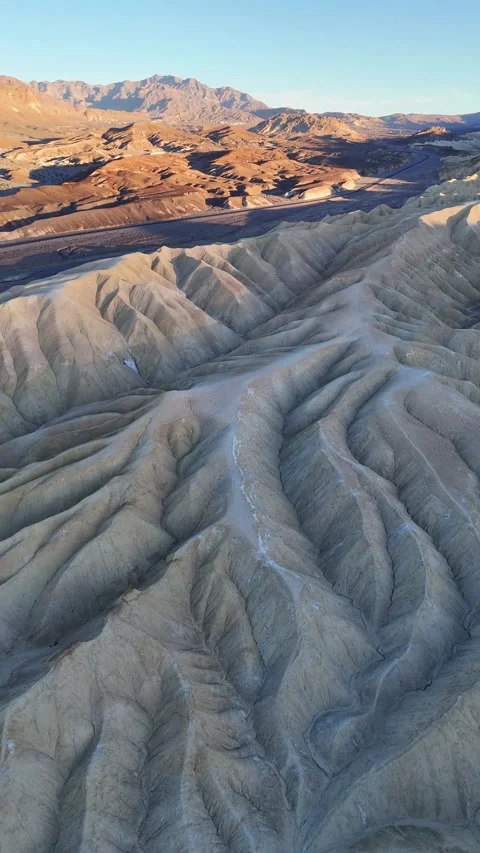 Vertical Drone Shot: Deep Geological Ridges in Death Valley Stock Footage 327163918