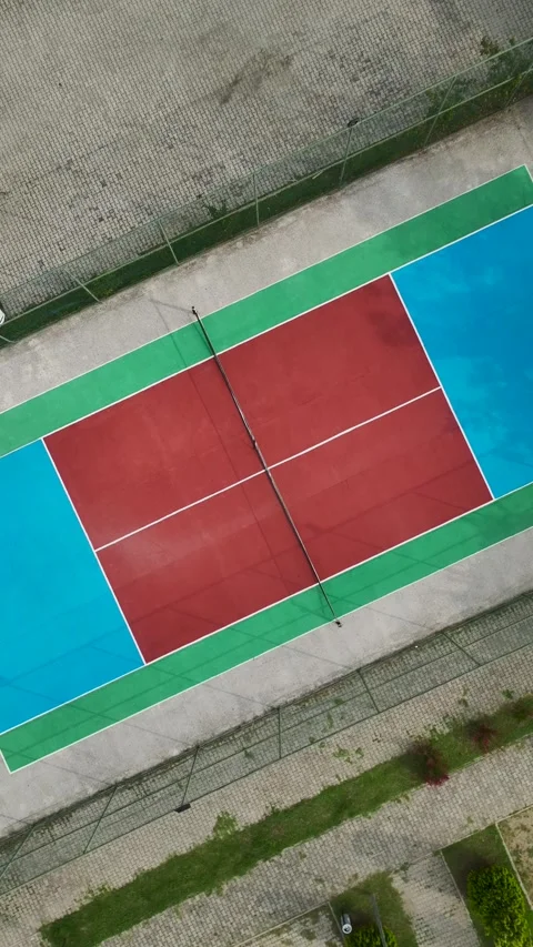 Vertical drone shot of empty tennis court from top view Stock Footage 341779102