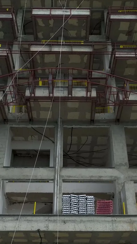 Vertical Drone Shot Minimalist Construction Interior with Repetitive Patterns Stock Footage 341870041