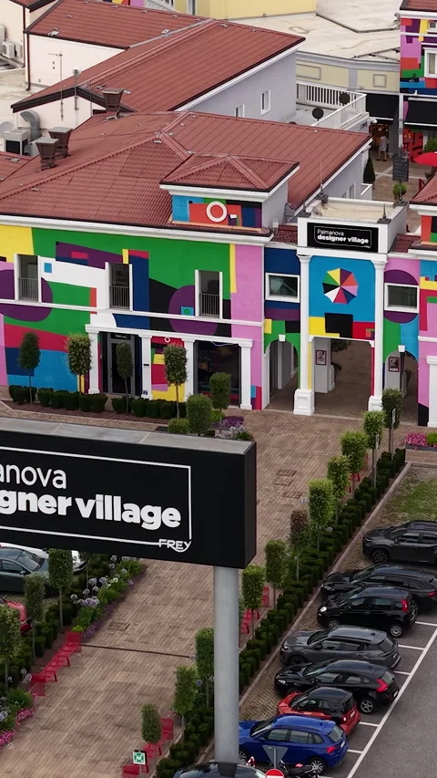 Vertical Drone Shot of Palmanova Designer Village, Entrance to Outlet Shopping Stockbeeldmateriaal 342078237