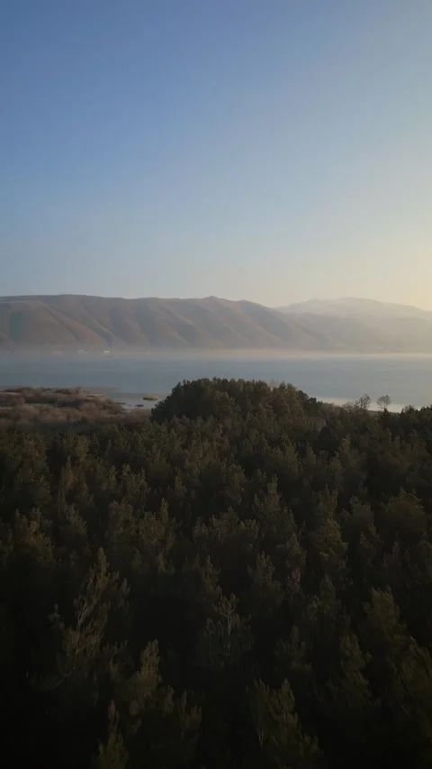 Vertical drone shot of Sunrise at Sevan Lake, Armenia 库存影片 230657383