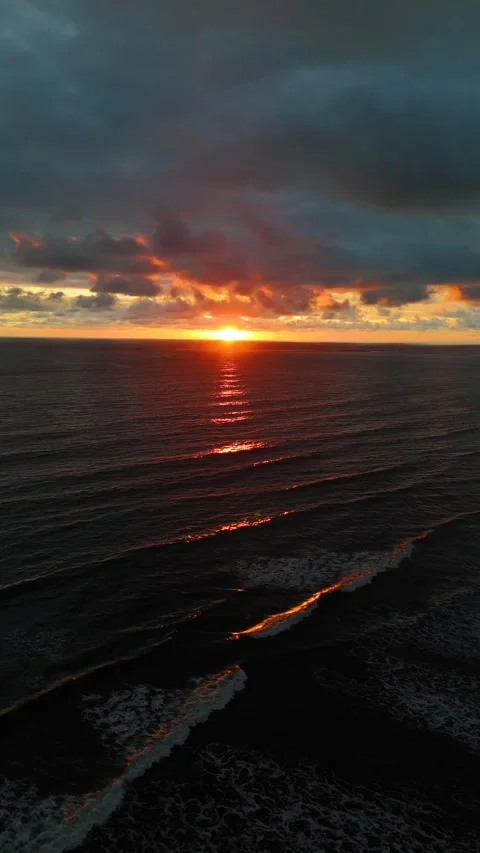 Vertical Drone Sunset Reflection Over Ocean at Playa Uvita Stock Footage 328598376