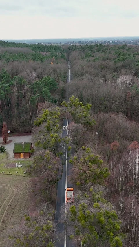 Vertical Drone Tilt-Up from Top-Down Road View to Horizon Video stock 323877174