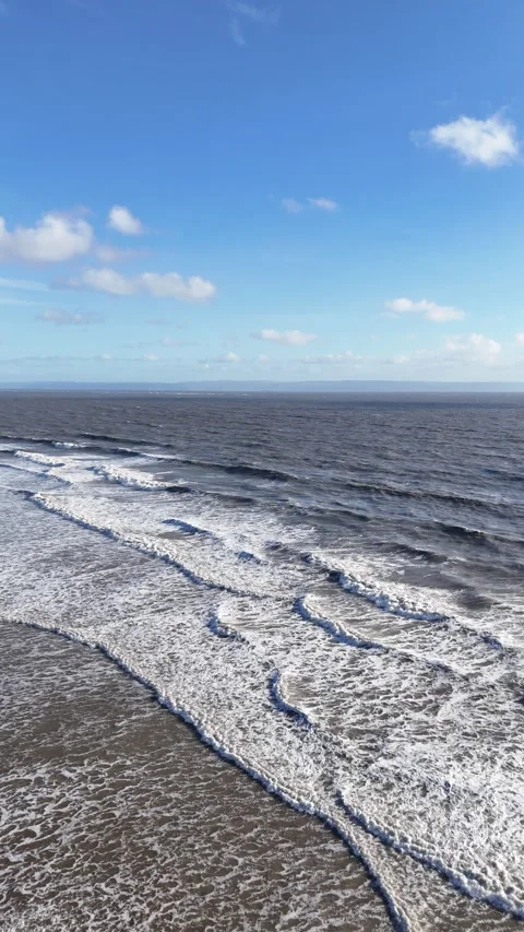 Vertical Drone Tracking Backwards Over Ocean Waves 4K Stock-Footage 334070749