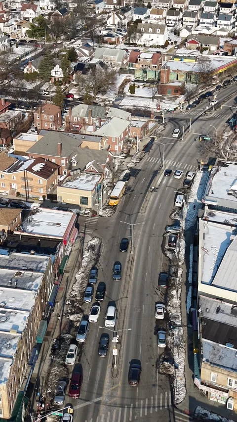 Vertical Drone Turn Across a Queens Avenue and Side Streets Stock-Footage 345615058