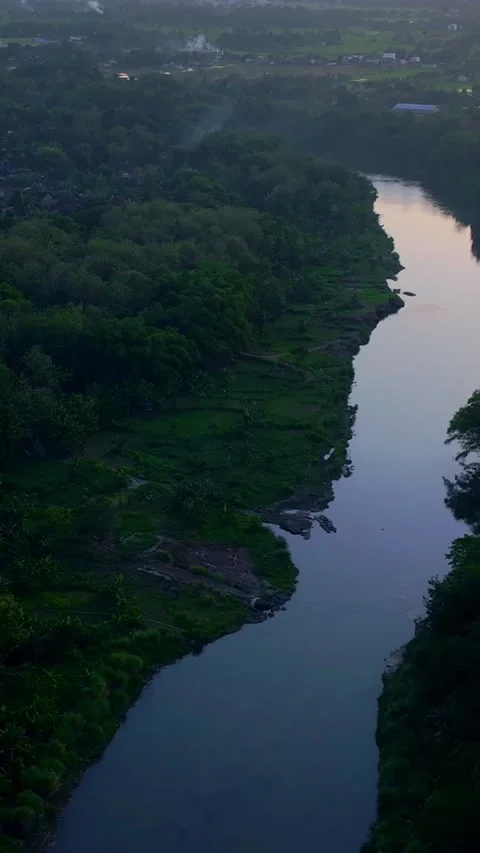 Vertical drone video of calm evening river Stock Footage 336316687