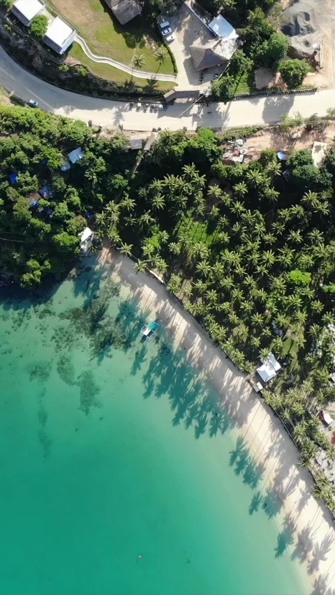 Vertical drone video of El Nido at sunrise from hidden beach Stockbeeldmateriaal 285830785