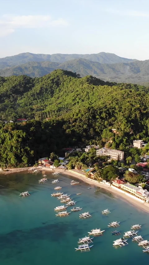Vertical drone video of El Nido at sunset in Palawan Видео 285833187