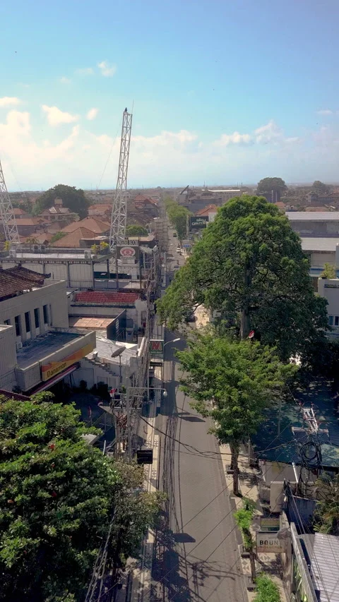Vertical drone video at empty Legian Road, Kuta, Bali Video stock 169221538