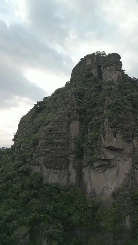 Vertical drone video. Rock formations, forested mountains and large formations Stock Footage 281208403