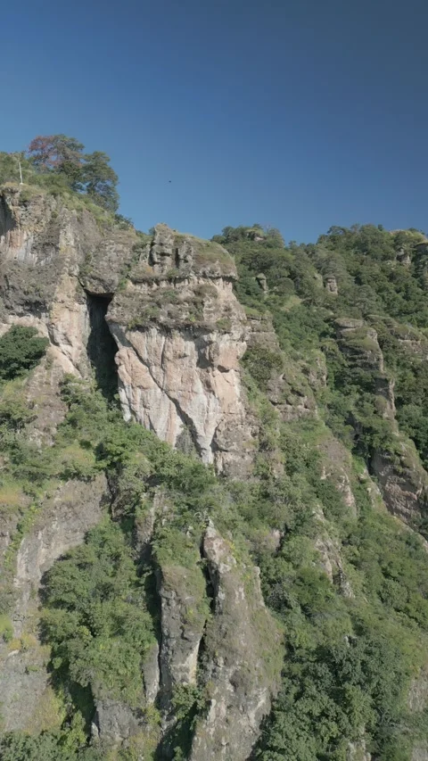 Vertical drone video. Rock formations, forested mountains and large formations Stock Footage 281208421