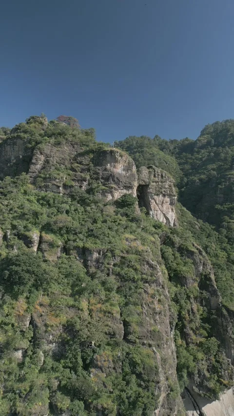 Vertical drone video. Rock formations, forested mountains and large formations Stock Footage 281208456