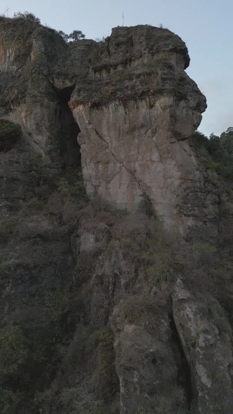 Vertical drone video. Rock formations, forested mountains Stock Footage 281671920