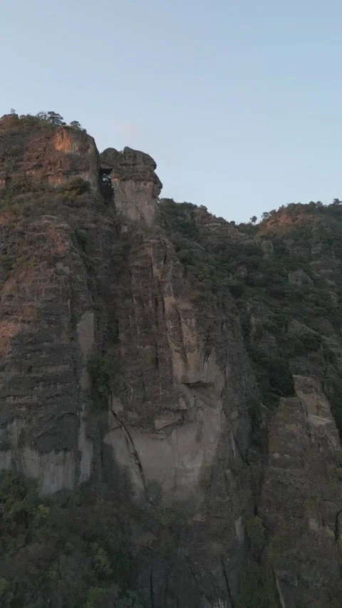 Vertical drone video. Rock formations, forested mountains Stock Footage 281672001