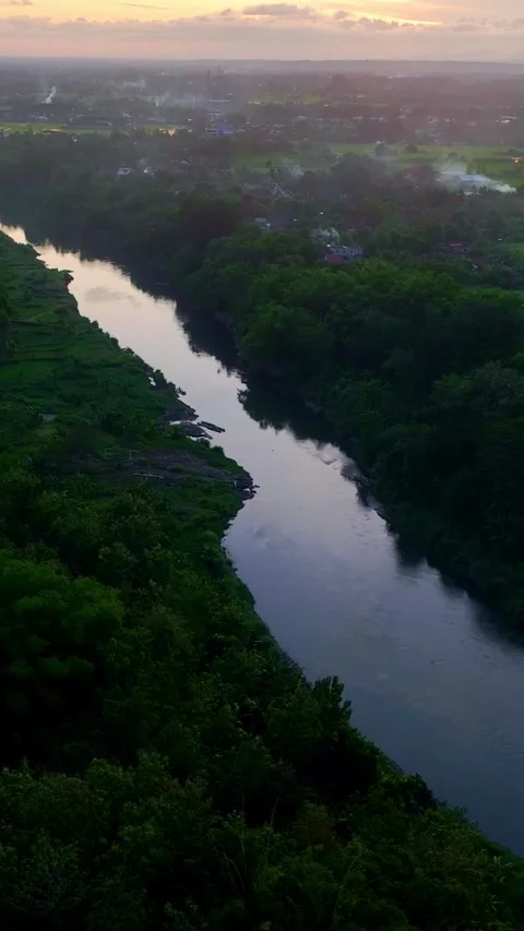Vertical drone video of sunset river bend Stock Footage 336316707