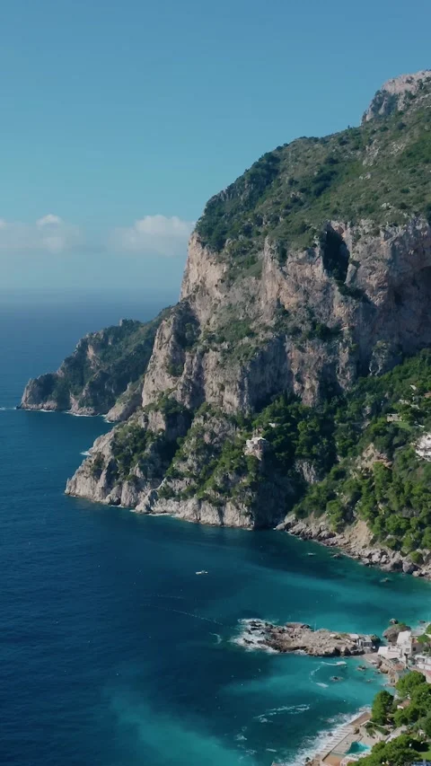 Vertical Drone View of Capri Island Coastline With Rocky Cliffs, Turquoise Stock Footage 330854064