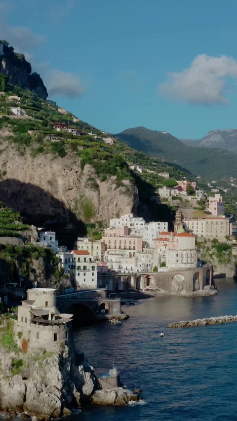 Vertical Drone View of Flying Along Narrow Road in Amalfi Coast Towards a Small Stock Footage 330989618