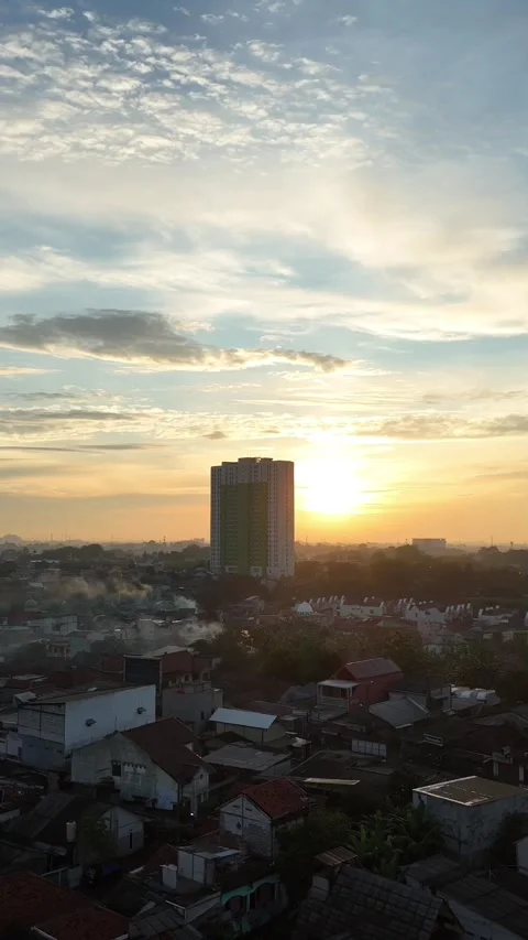 Vertical Drone View of Modern Apartment Tower in Suburban Area at Sunset Stock Footage 328280397