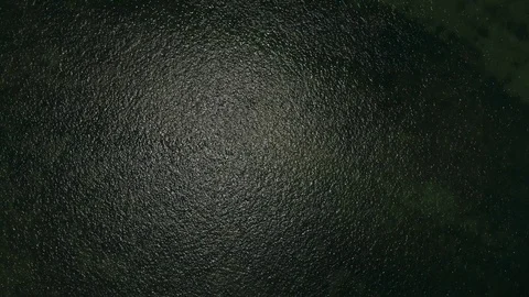 Vertical Drone View of Ocean Waves with Sunlight Reflection Stock Footage 93117357