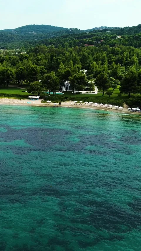 Vertical drone view over turquoise sea and sandy beach, Greece Stock Footage 342238332